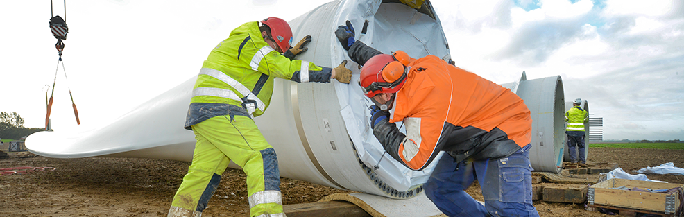 Green Jobs. Two workers wearing personal protection equipment